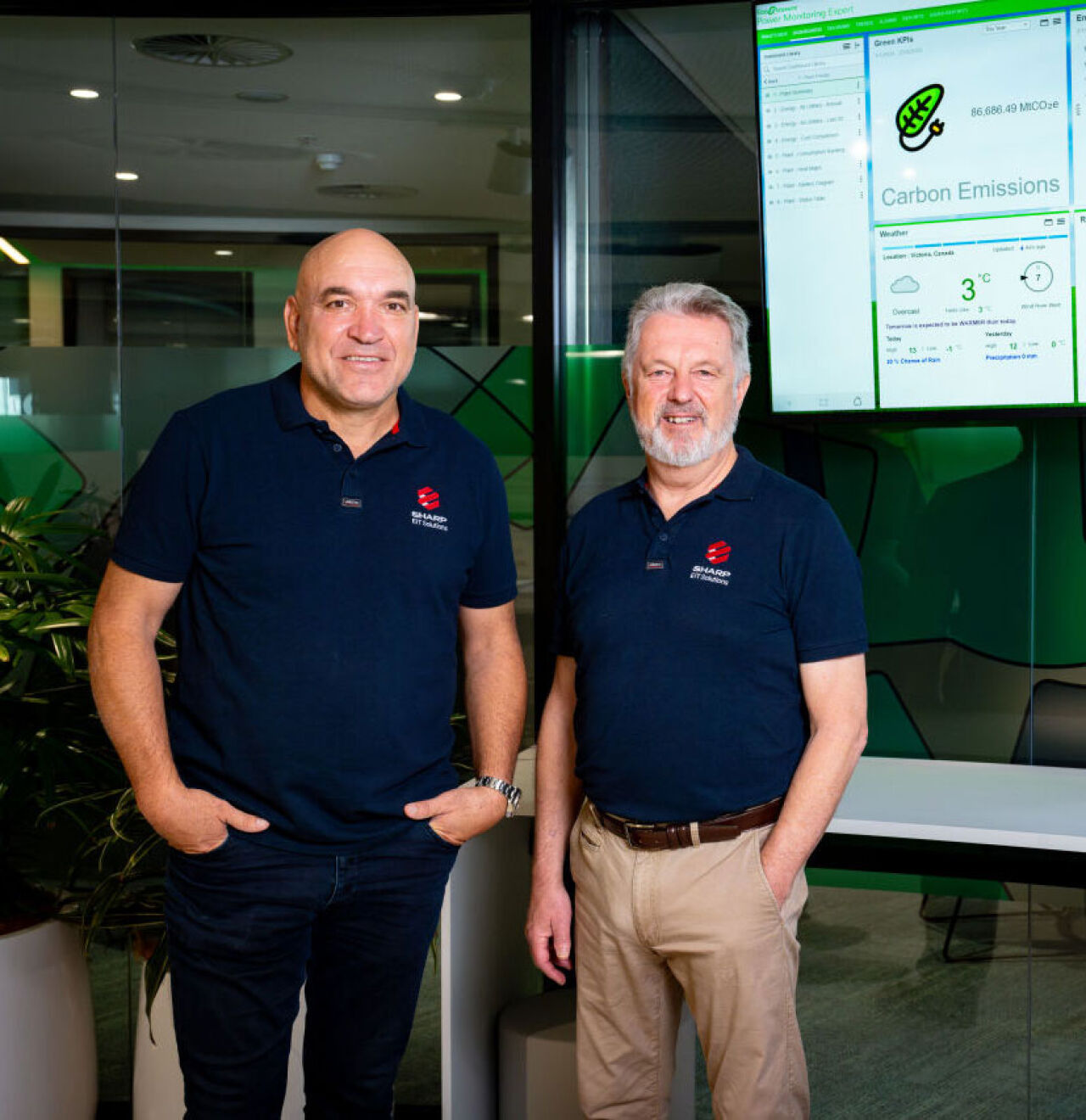Sharp EIT commercial solar ambassador Gorden Tallis with commercial solar expert Neil Armstrong